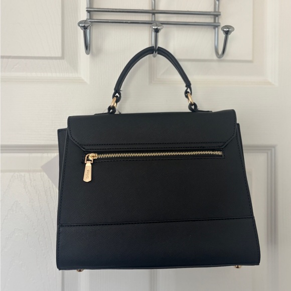 Sleek Sophisticated Trina Turk Black Handbag or Crossbody with Gold Hardware - Picture 3 of 11